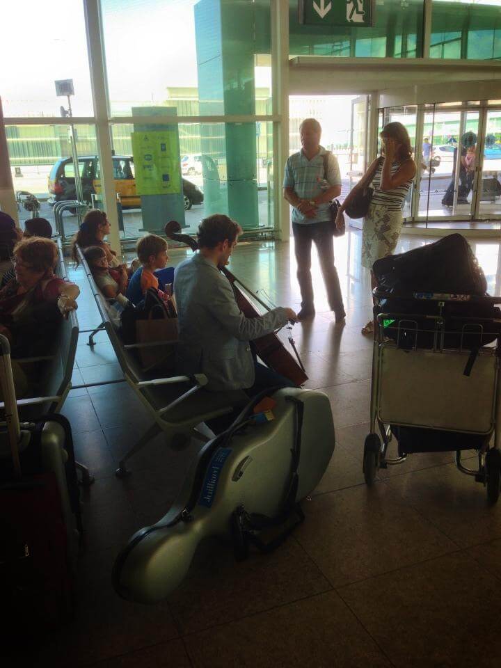 Barcelona Airport playing cello Tommy Mesa